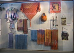 colorful panel with weavings and feltings